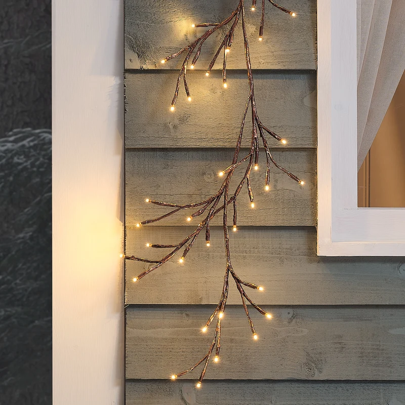 1,5 m LED-Zweiggirlande außen in Bronze mit 80 warmweißen LEDs und Timer
