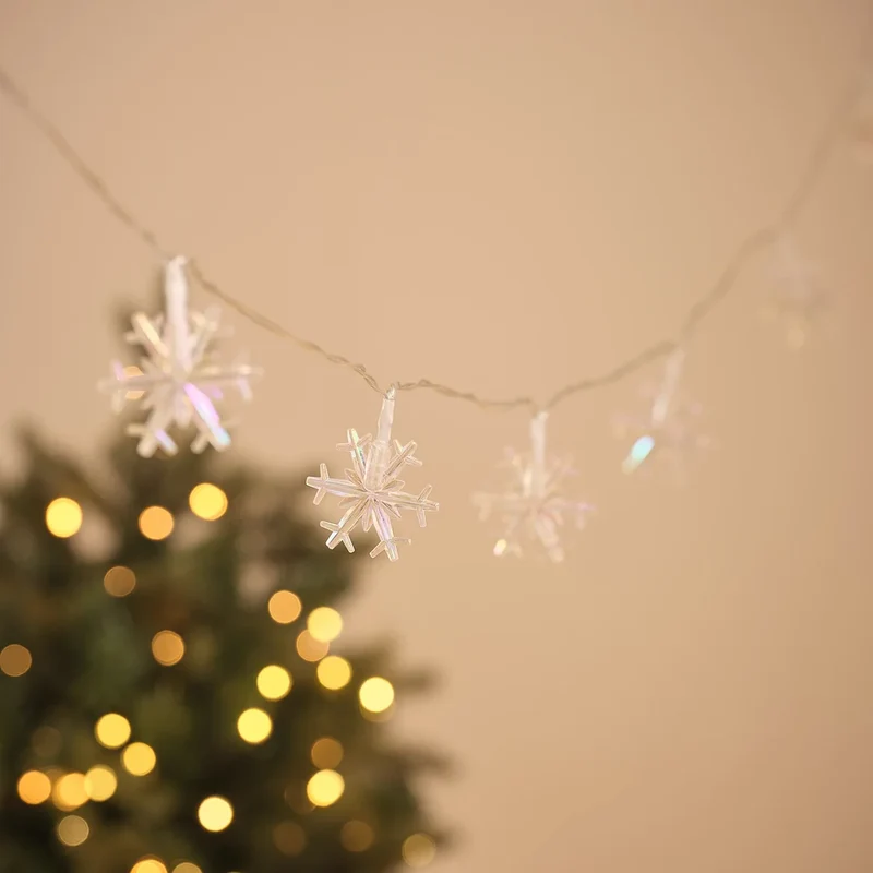 Warmweiße LED-Lichterkette mit 20 irisierenden Schneeflocken