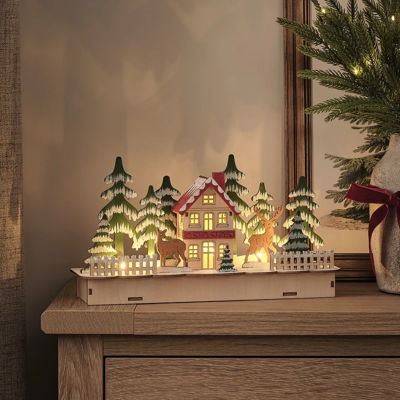 LED-Holzhaus Winterlandschaft mit Rentieren in Warmweiß