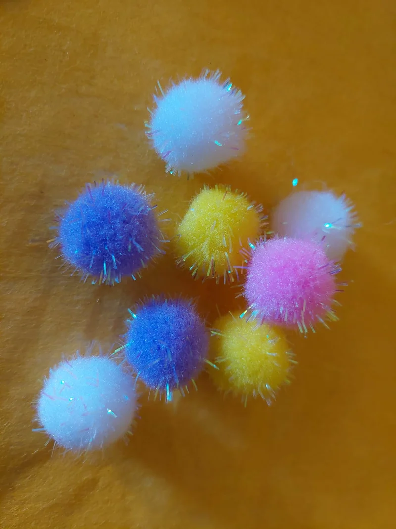 Pompon mit Glitzer