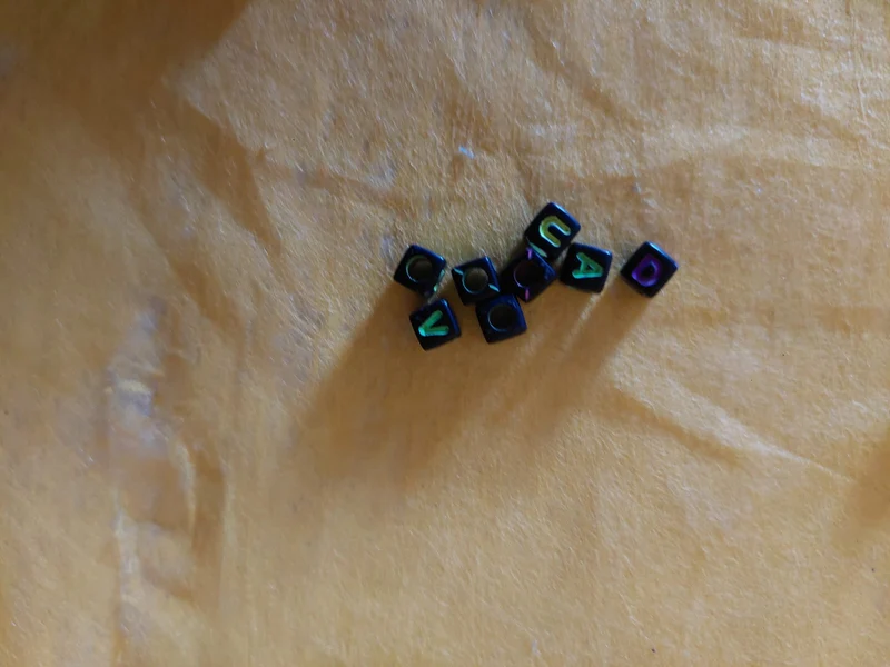 Perlen mit Buchstaben