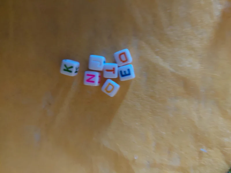Perlen mit Buchstaben