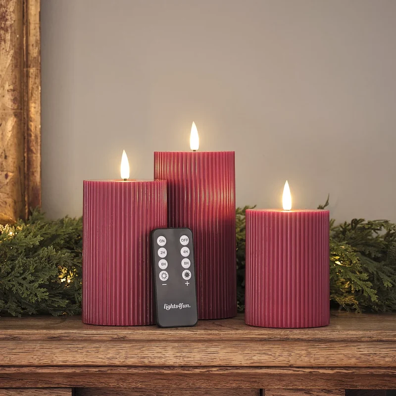 3er Set TruGlow® LED-Stumpenkerzen in Weinrot mit Rippenstruktur und Fernbedienung