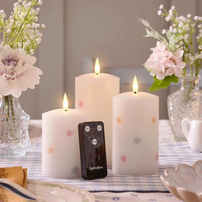3er Set TruGlow® LED-Kerzen mit Blumen & Fernbedienung