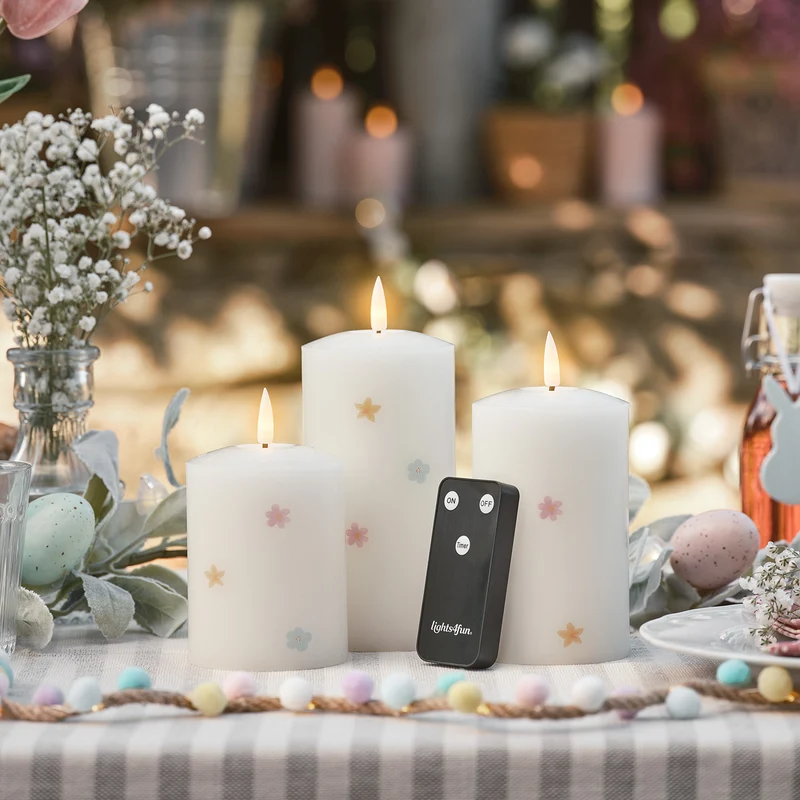 3er Set TruGlow® LED-Kerzen mit Blumen & Fernbedienung