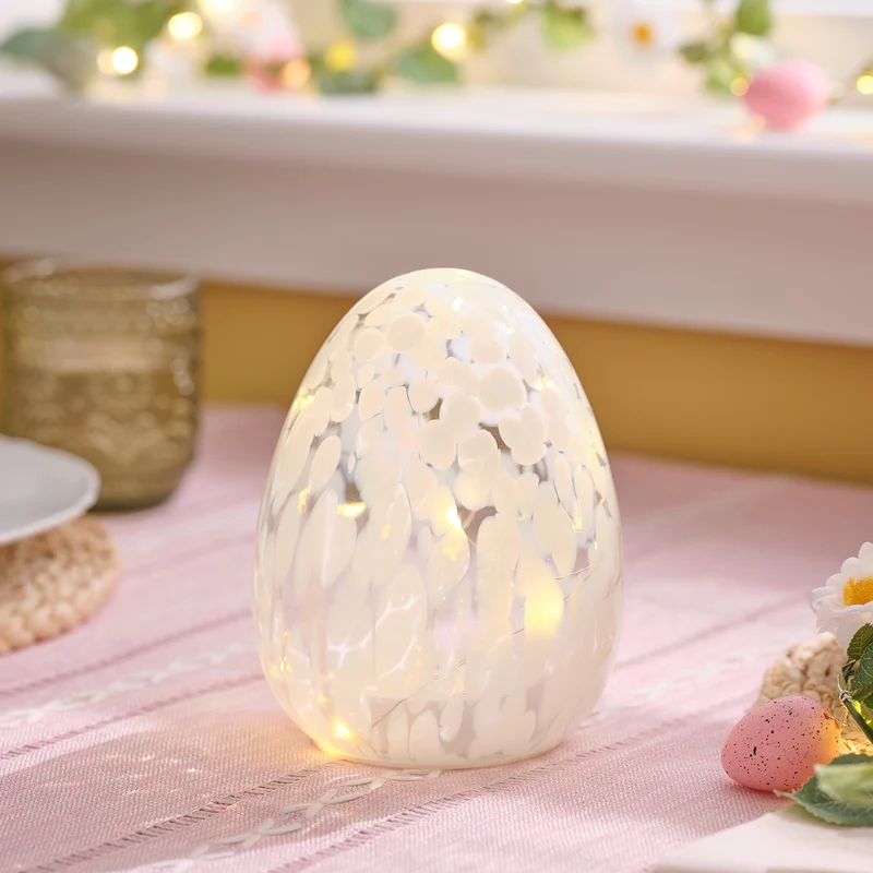 Weißes LED-Osterei aus Glas mit Konfettieffekt & Timer