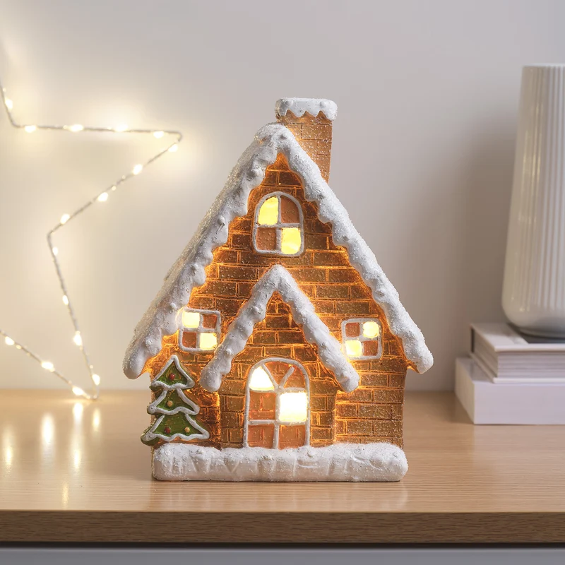 Leuchtende Häuschen & Lichterkette mit Lebkuchenmännchen