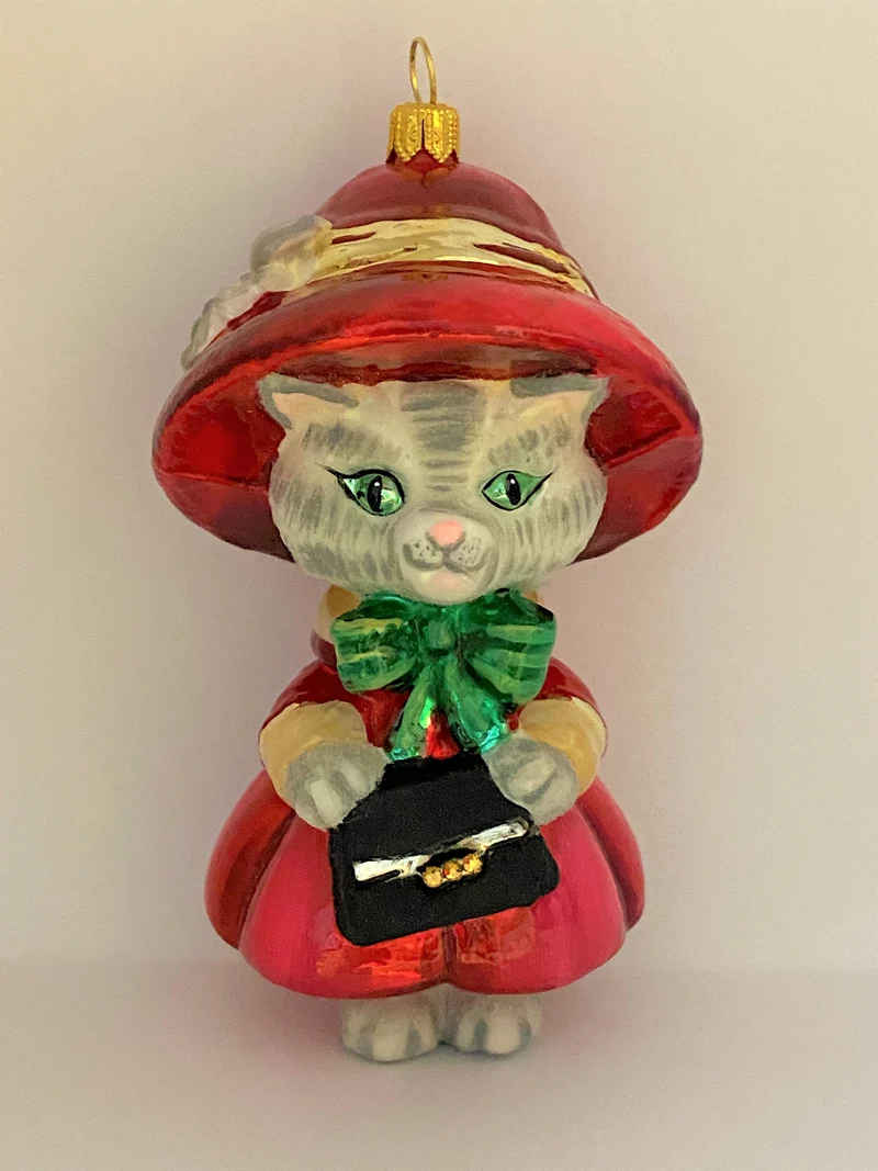 Katzenmädchen im roten Kleid mit Handtasche, KOMOZJA MOSTOWSKI