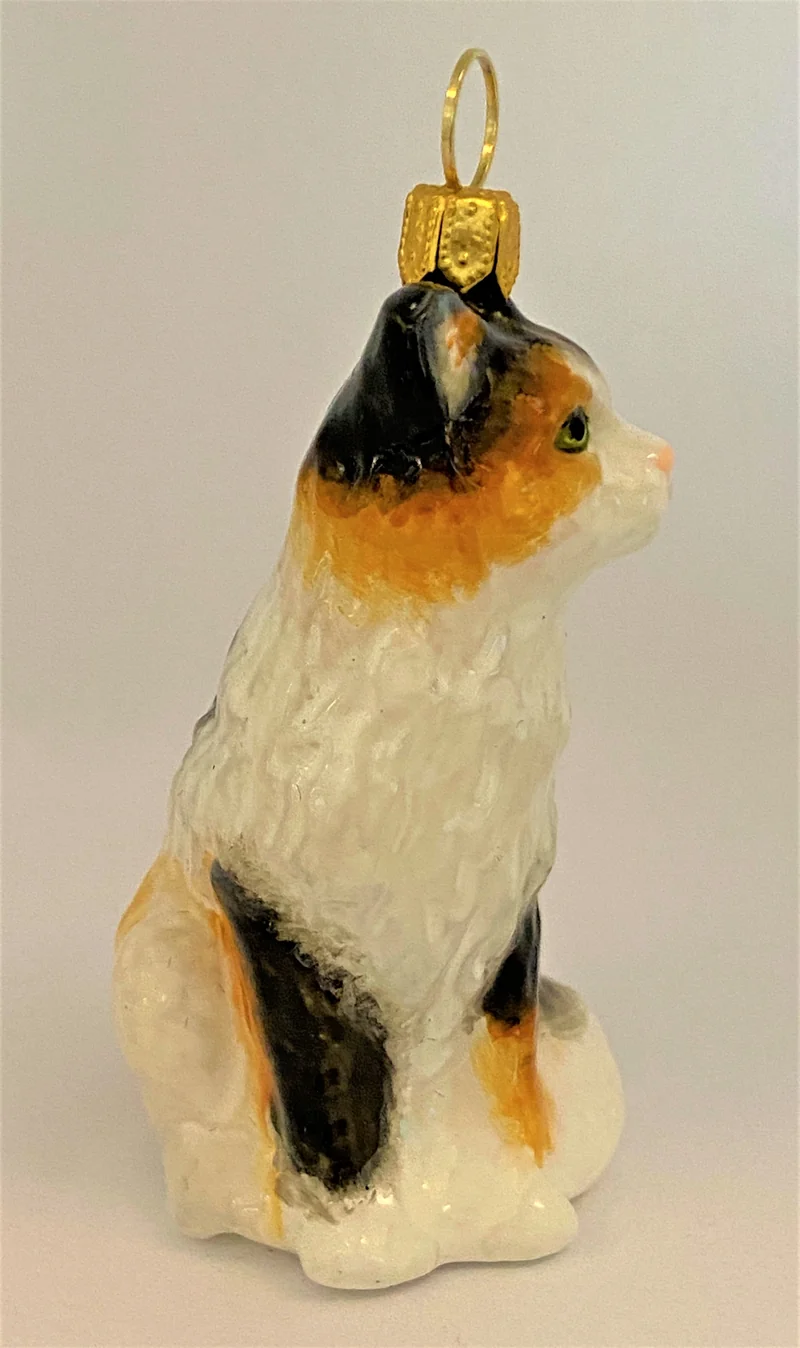 Kleine Drei-Farben Katze, KOMOZJA MOSTOWSKI