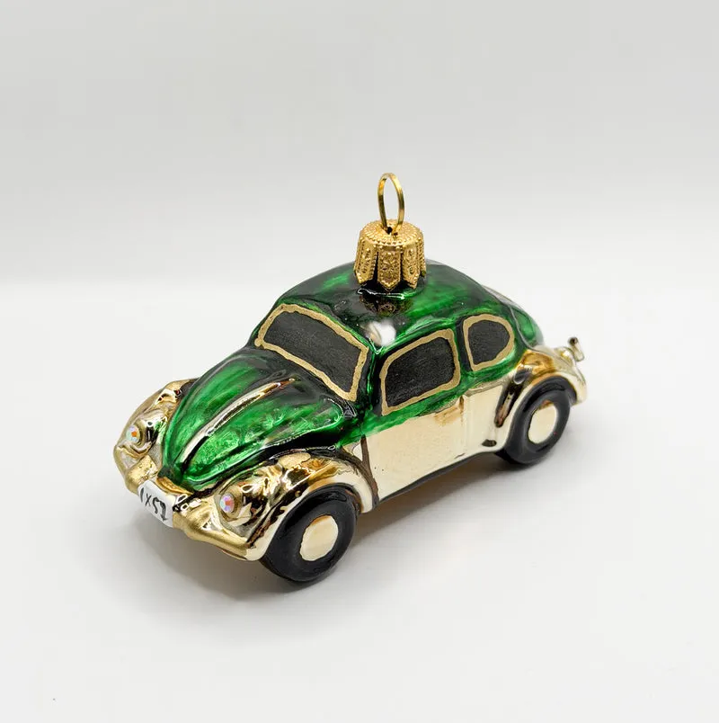 VW-Käfer gold mit grünem Dach