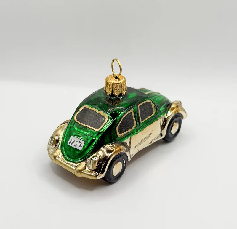 VW-Käfer gold mit grünem Dach