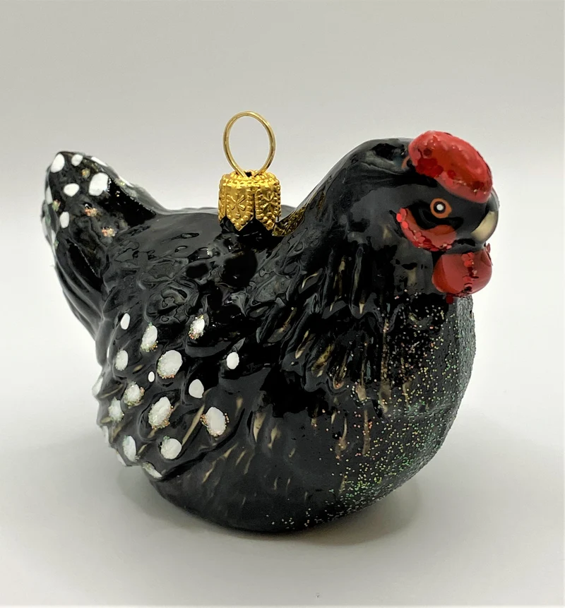 Huhn schwarz-weiss getupft