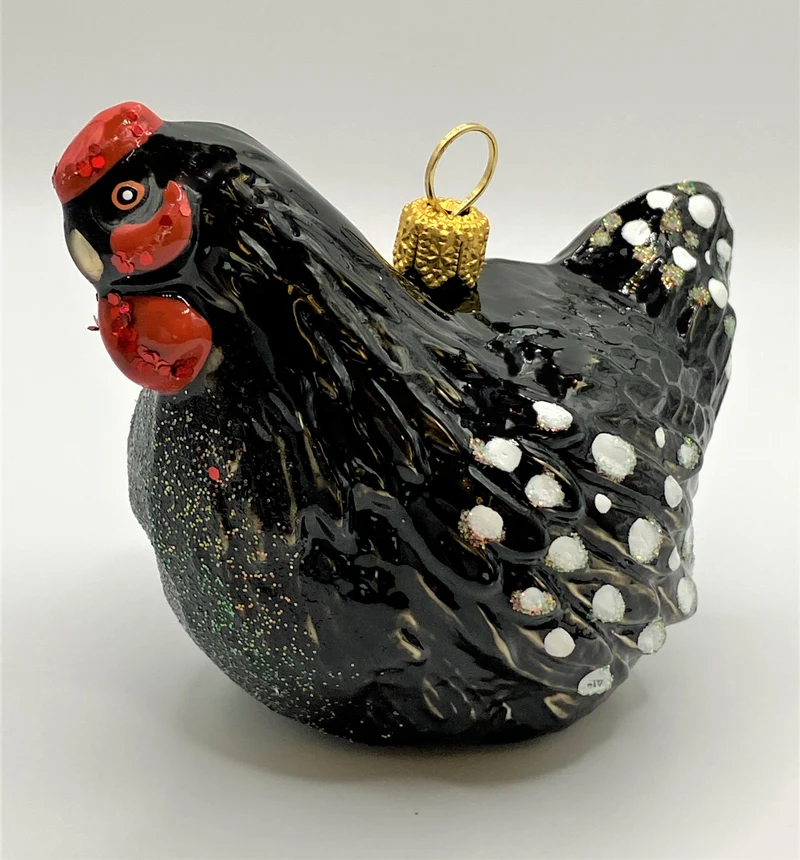 Huhn schwarz-weiss getupft