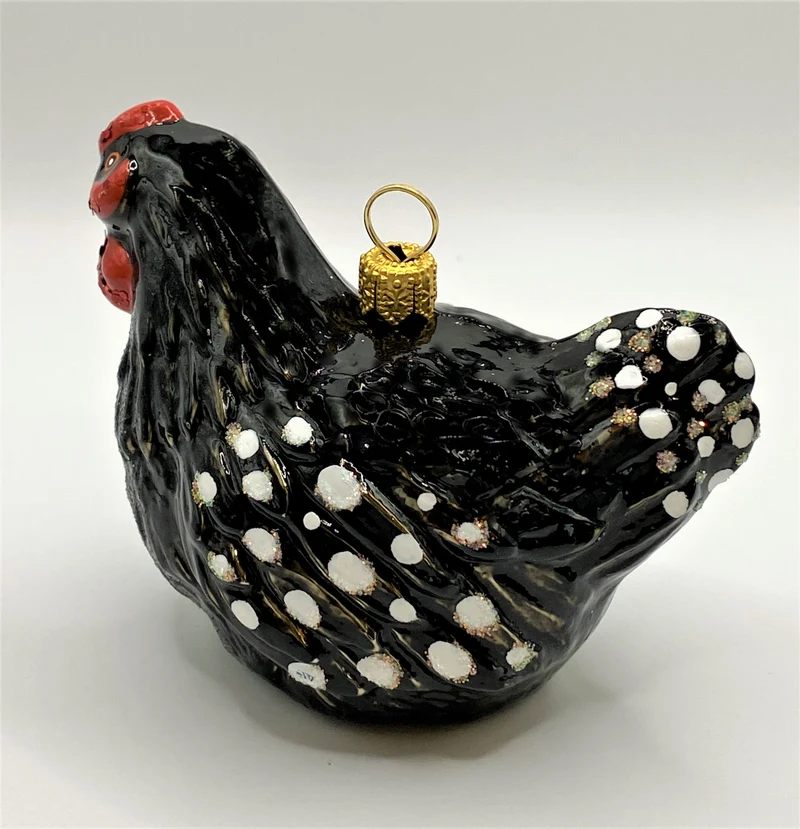 Huhn schwarz-weiss getupft