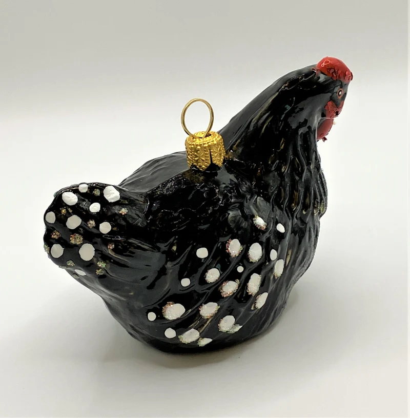 Huhn schwarz-weiss getupft