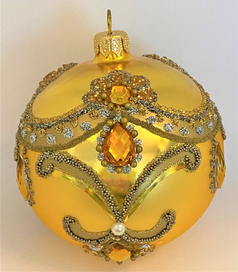 Goldene Kugel barock mit Volant und goldenen Schmucksteinen
