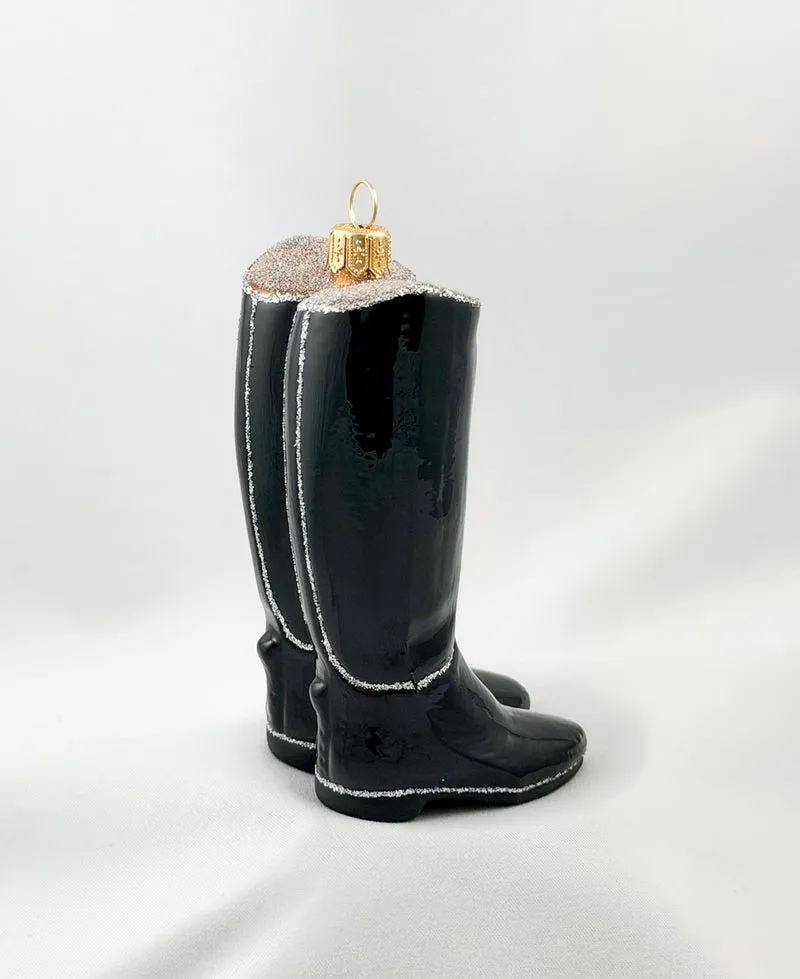 Schwarze englische Reiter-Stiefel