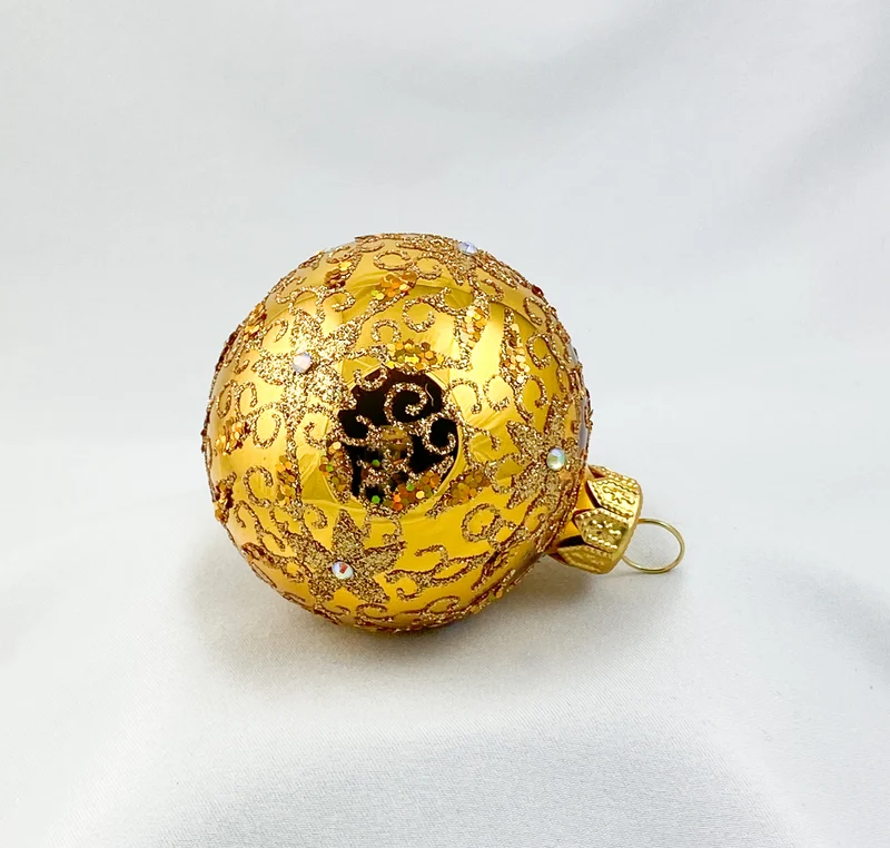 Kugel gold glanz mit goldenem Kringel Muster