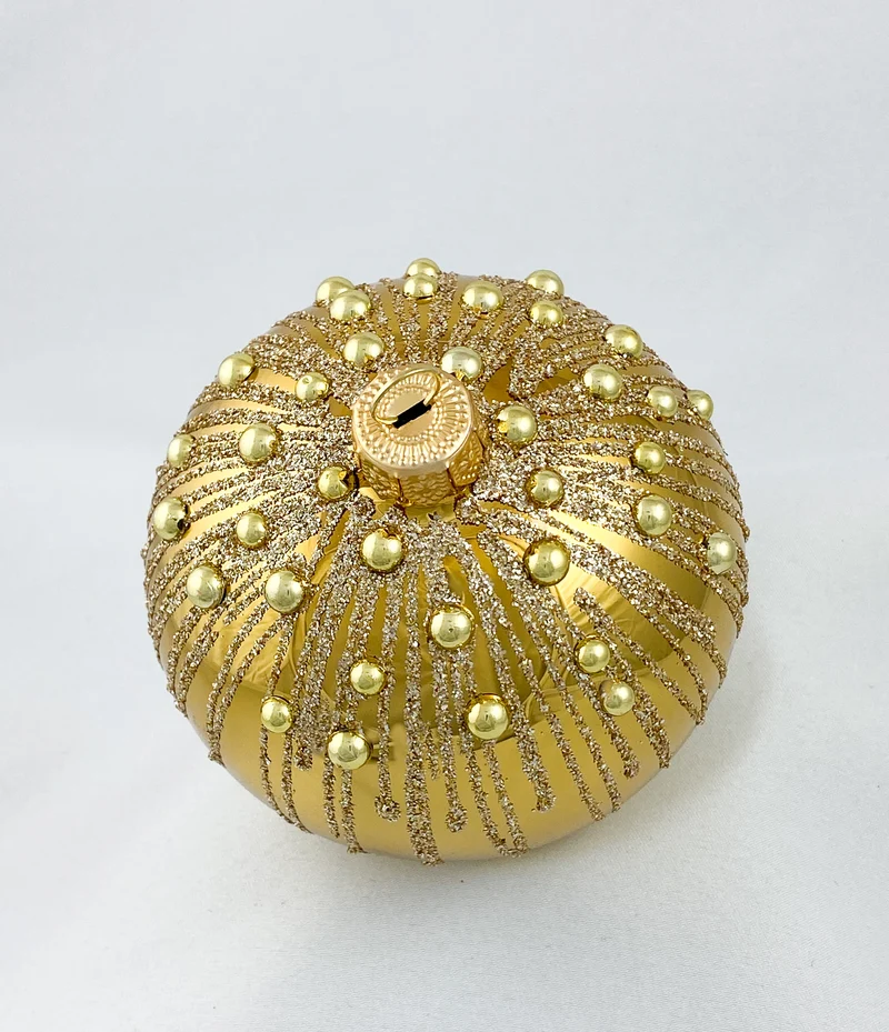 Kugel gold glänzend mit Schmucksteinen