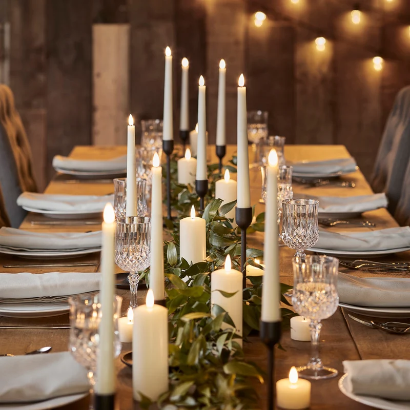4er Set TruGlow® LED Stabkerzen Echtwachs mit Fernbedienung
