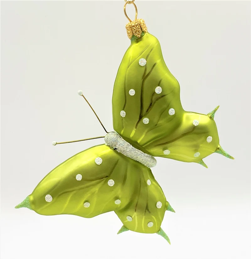 Schmetterling hellgrün, weisse Tupfen