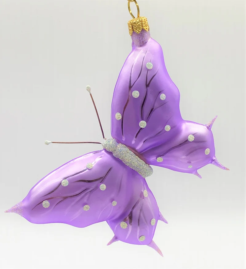 Schmetterling lila, weisse Tupfen