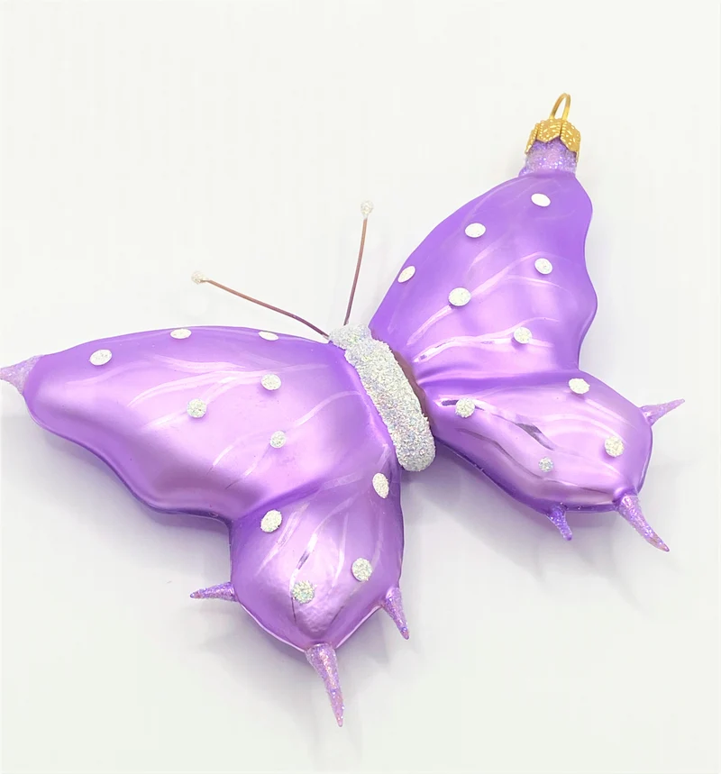 Schmetterling lila, weisse Tupfen