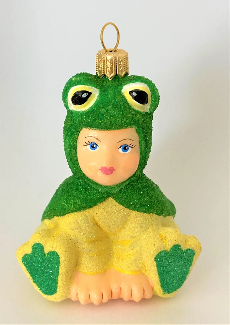 Kind im Froschkostüm, KOMOZJA MOSTOWSKI