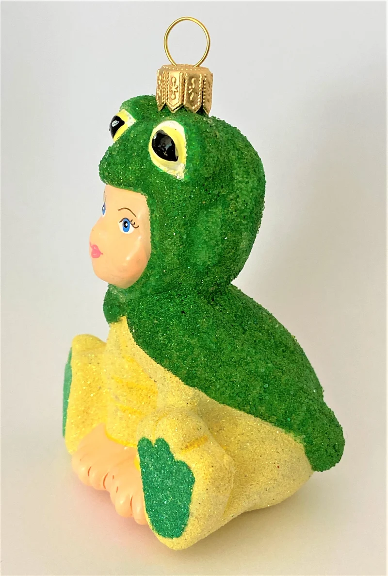 Kind im Froschkostüm, KOMOZJA MOSTOWSKI