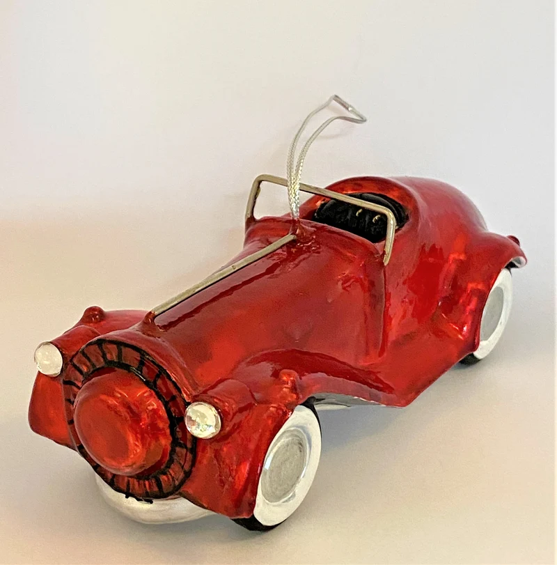 Rotes Oldtimer Rennauto, KOMOZJA MOSTOWSKI