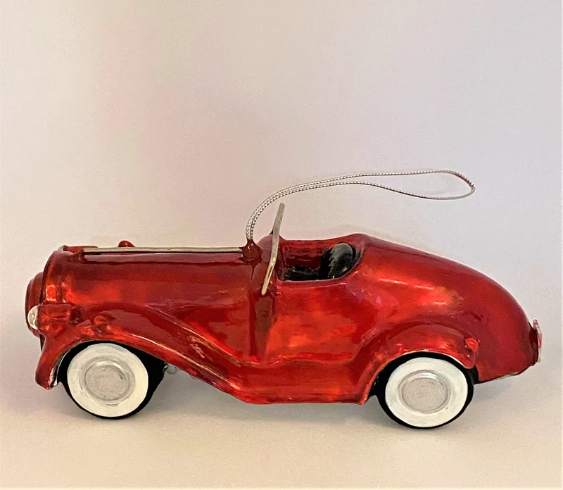 Rotes Oldtimer Rennauto, KOMOZJA MOSTOWSKI