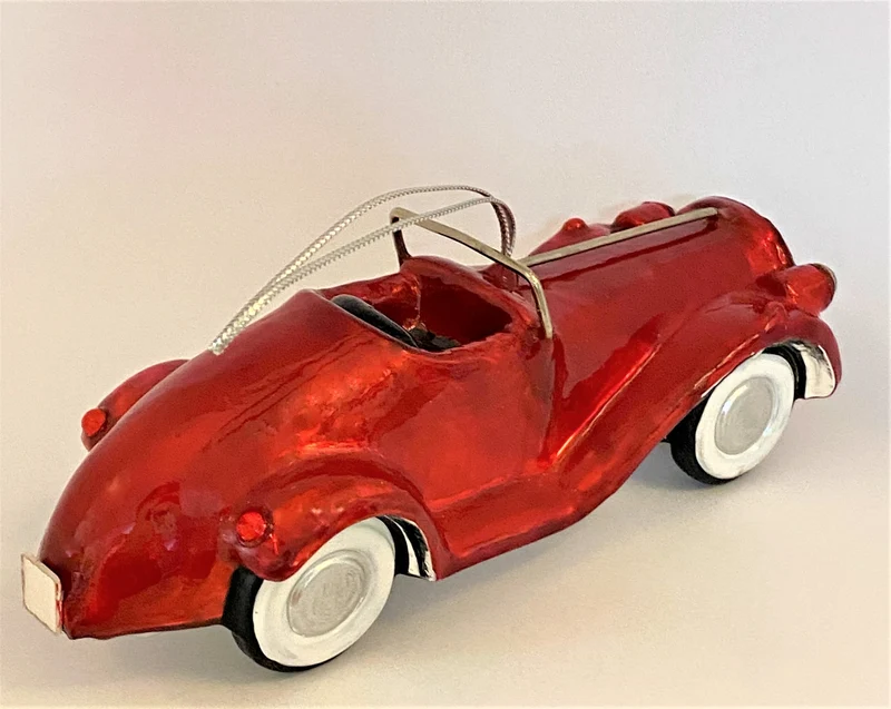 Rotes Oldtimer Rennauto, KOMOZJA MOSTOWSKI
