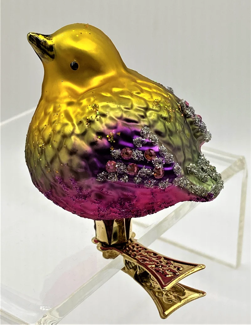 Vögelchen mit violettem Bauch und Glitzersteinchen auf Clip