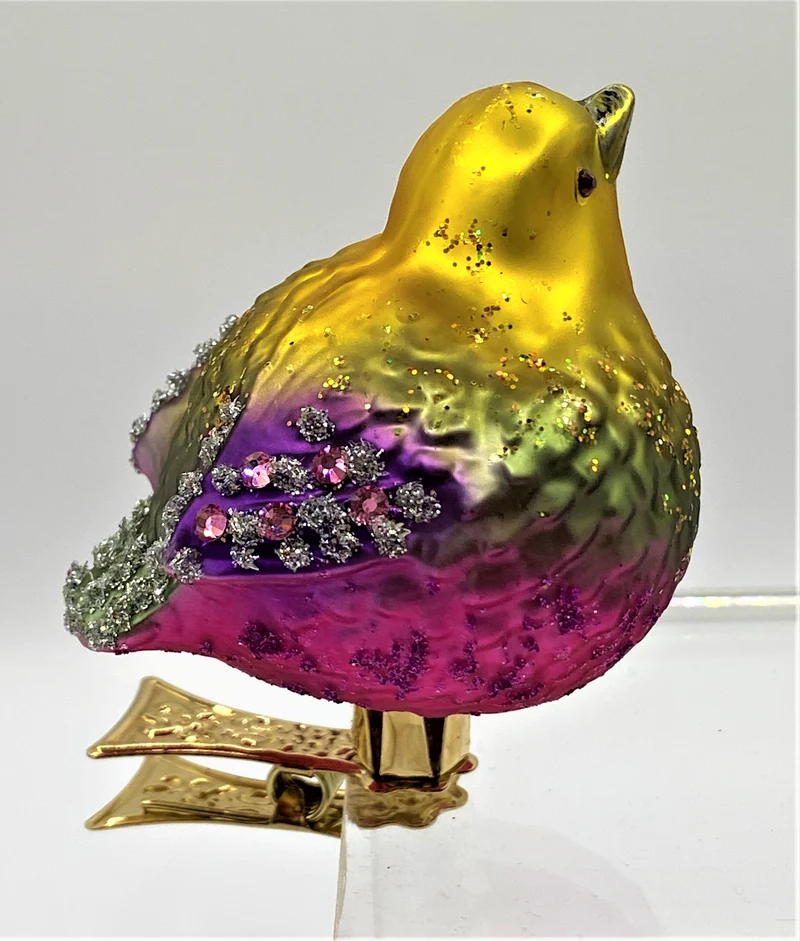 Vögelchen mit violettem Bauch und Glitzersteinchen auf Clip