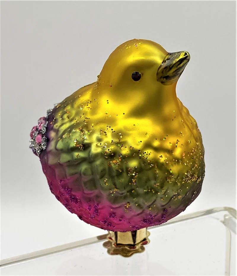 Vögelchen mit violettem Bauch und Glitzersteinchen auf Clip