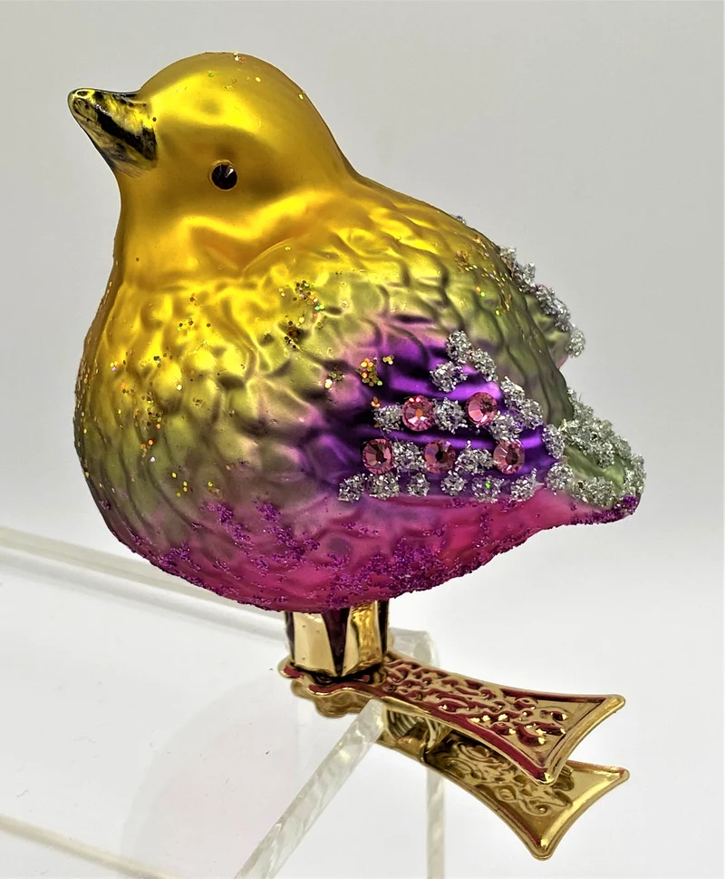 Vögelchen mit violettem Bauch und Glitzersteinchen auf Clip