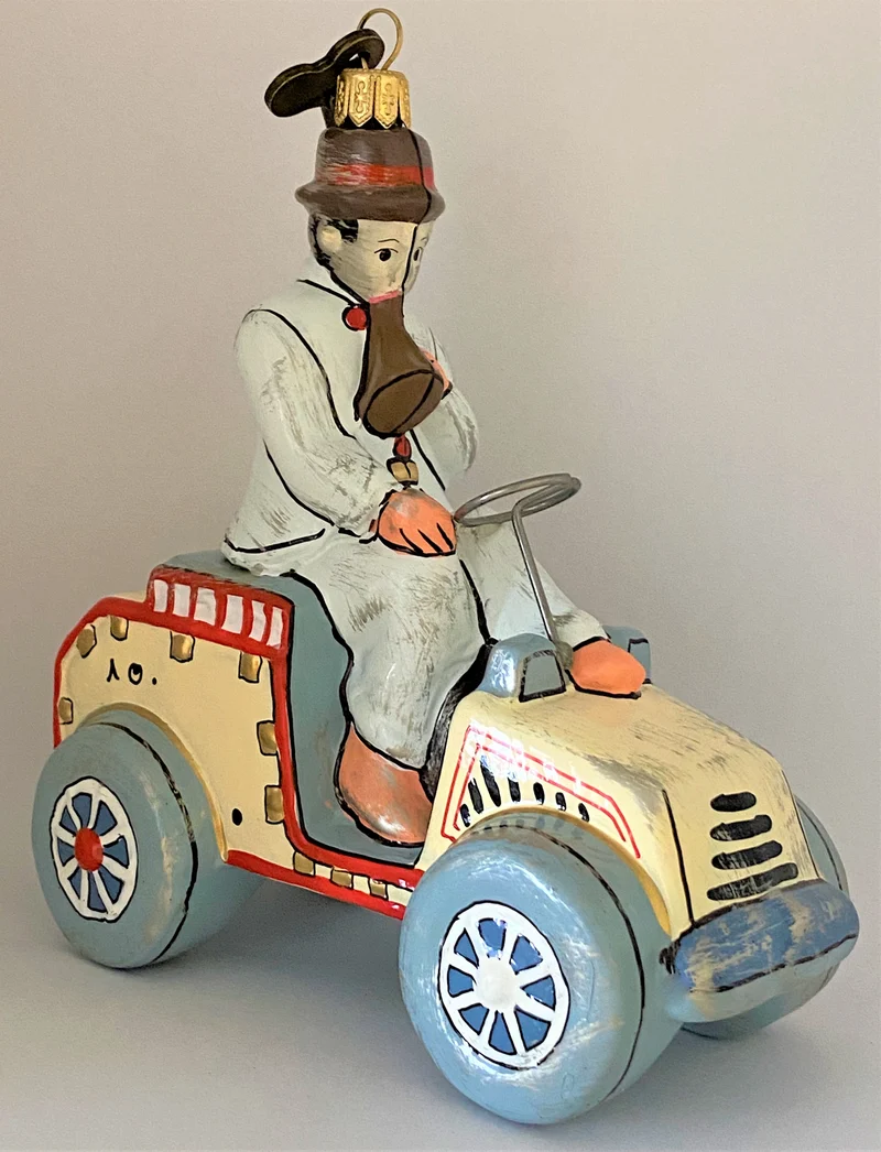 Spielzeug Oldtimer mit Fahrer