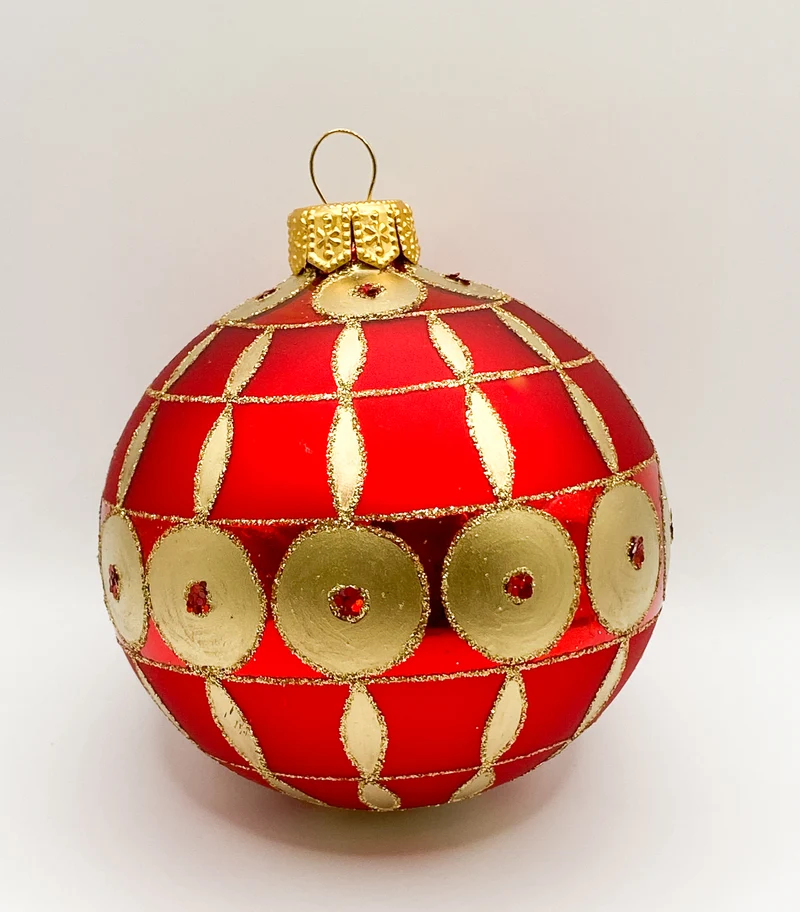 Rote Kugel mit goldenem Art-Deco Muster