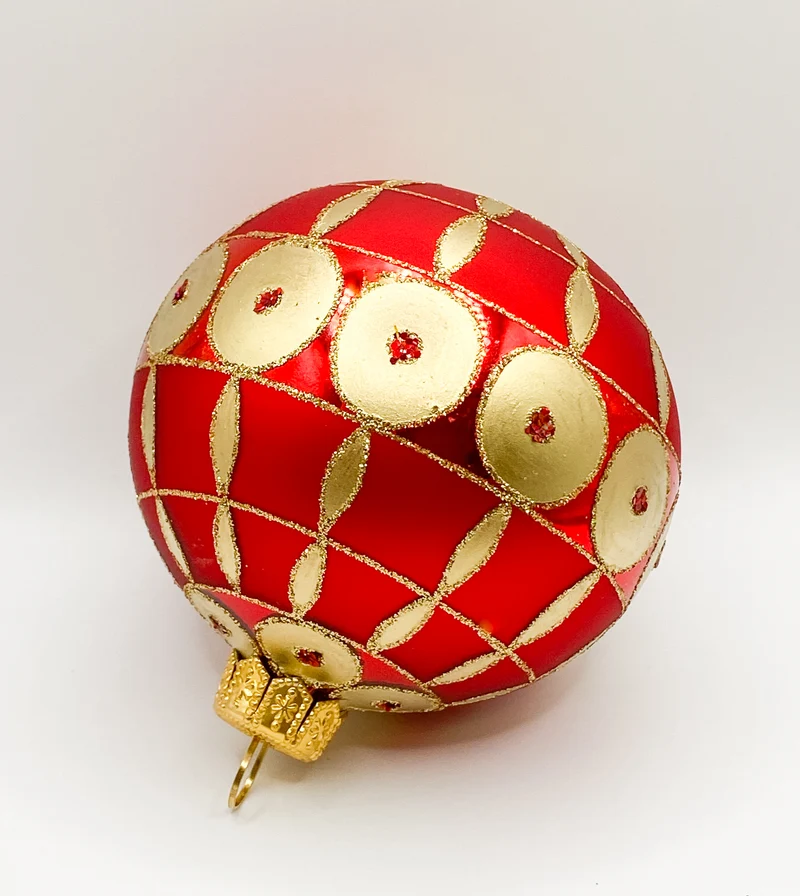 Rote Kugel mit goldenem Art-Deco Muster