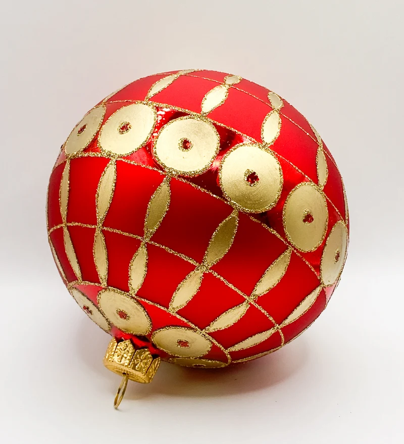 Rote Kugel mit goldenem Art-Deco Muster
