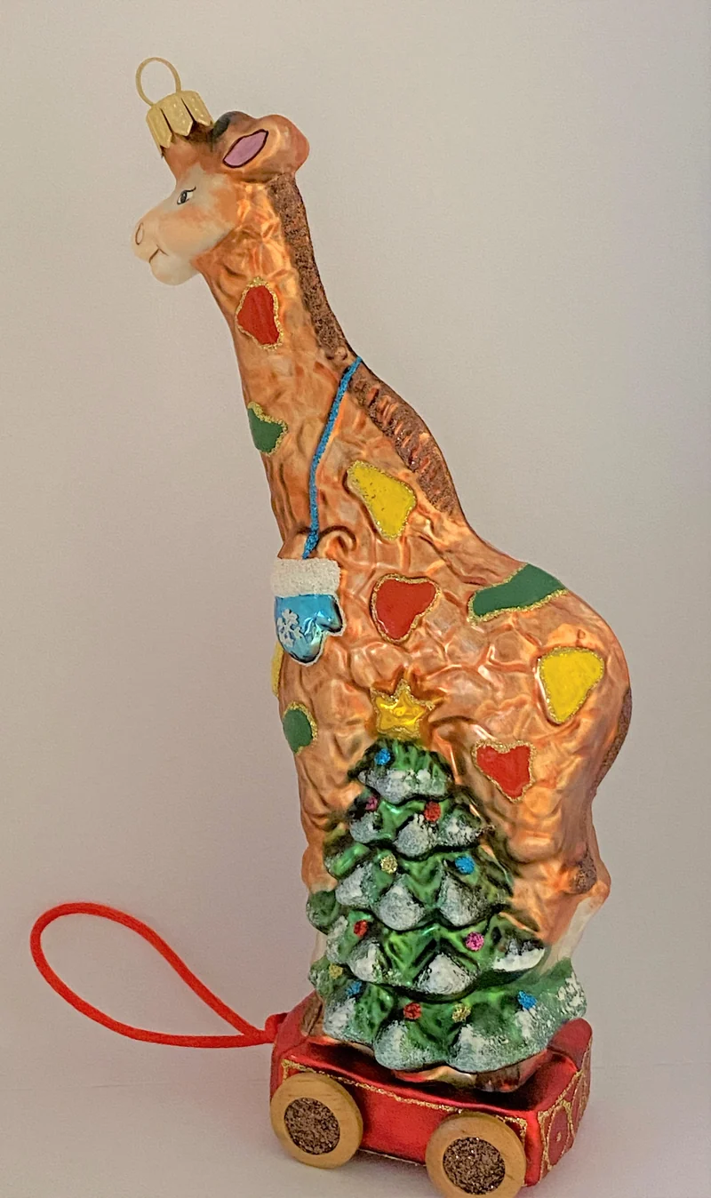 Spielzeug Giraffe auf Wägelchen