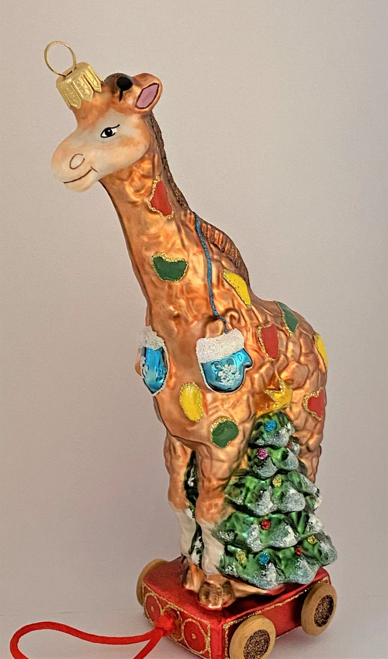 Spielzeug Giraffe auf Wägelchen