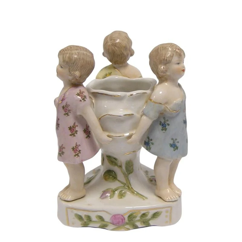 Casa Padrino Luxus Porzellan Übertopf Drei Kinder am Blütenkelch Weiß / Rosa / Gold 11,5 x H. 14,5 cm - Kleine Vase - Barock Deko