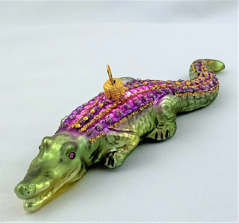 Krokodil, grün mit violettem Rücken
