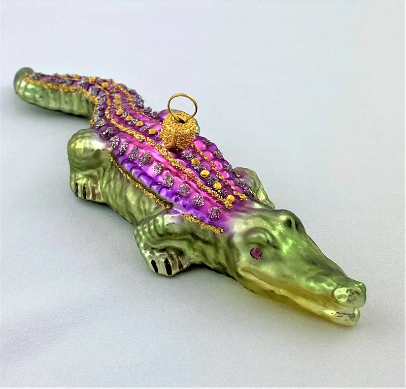 Krokodil, grün mit violettem Rücken