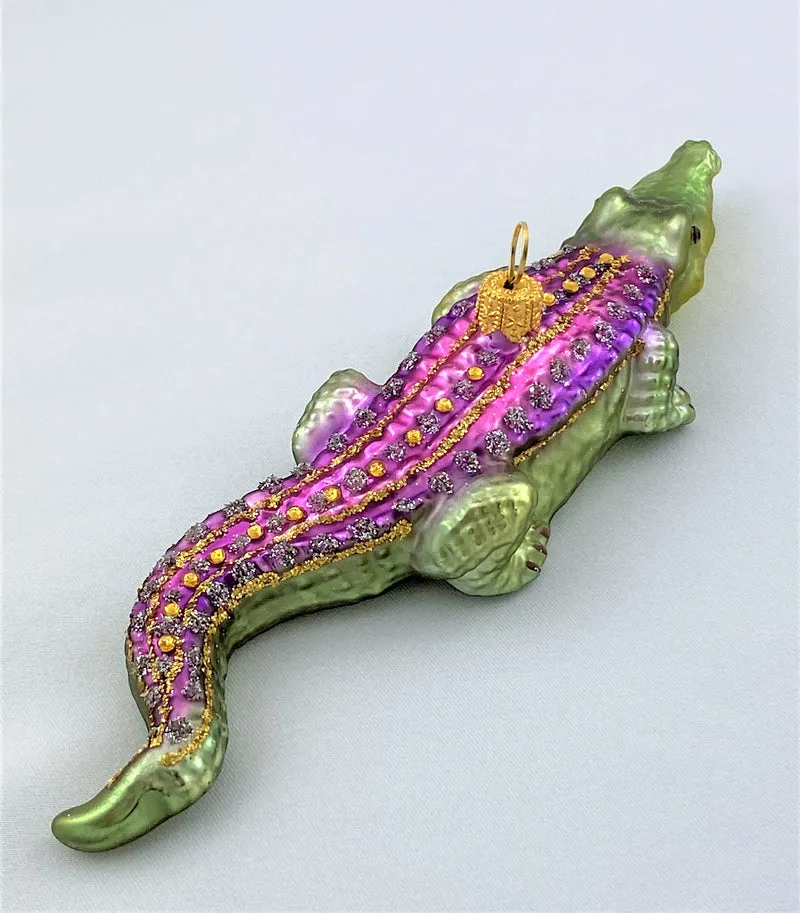 Krokodil, grün mit violettem Rücken