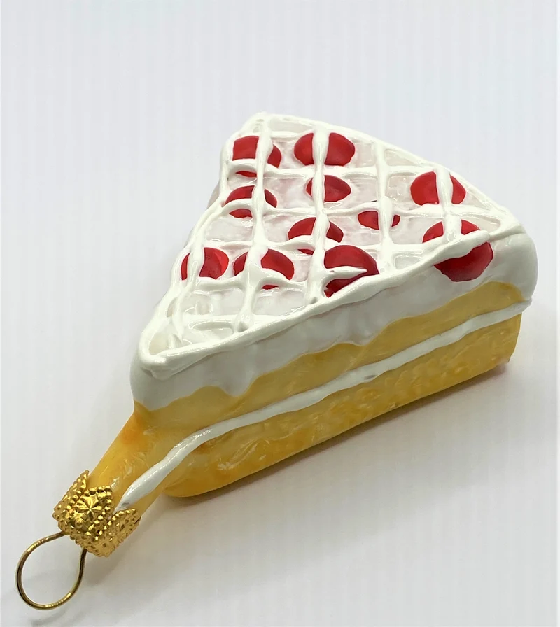 Stück Johannisbeertorte mit Gitterzuckerguss