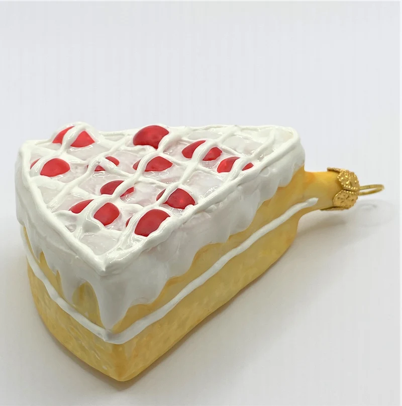 Stück Johannisbeertorte mit Gitterzuckerguss