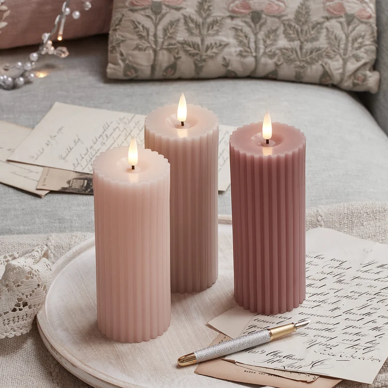 TruGlow® LED Kerzen Echtwachs Trio rosa geriffelt mit Fernbedienung