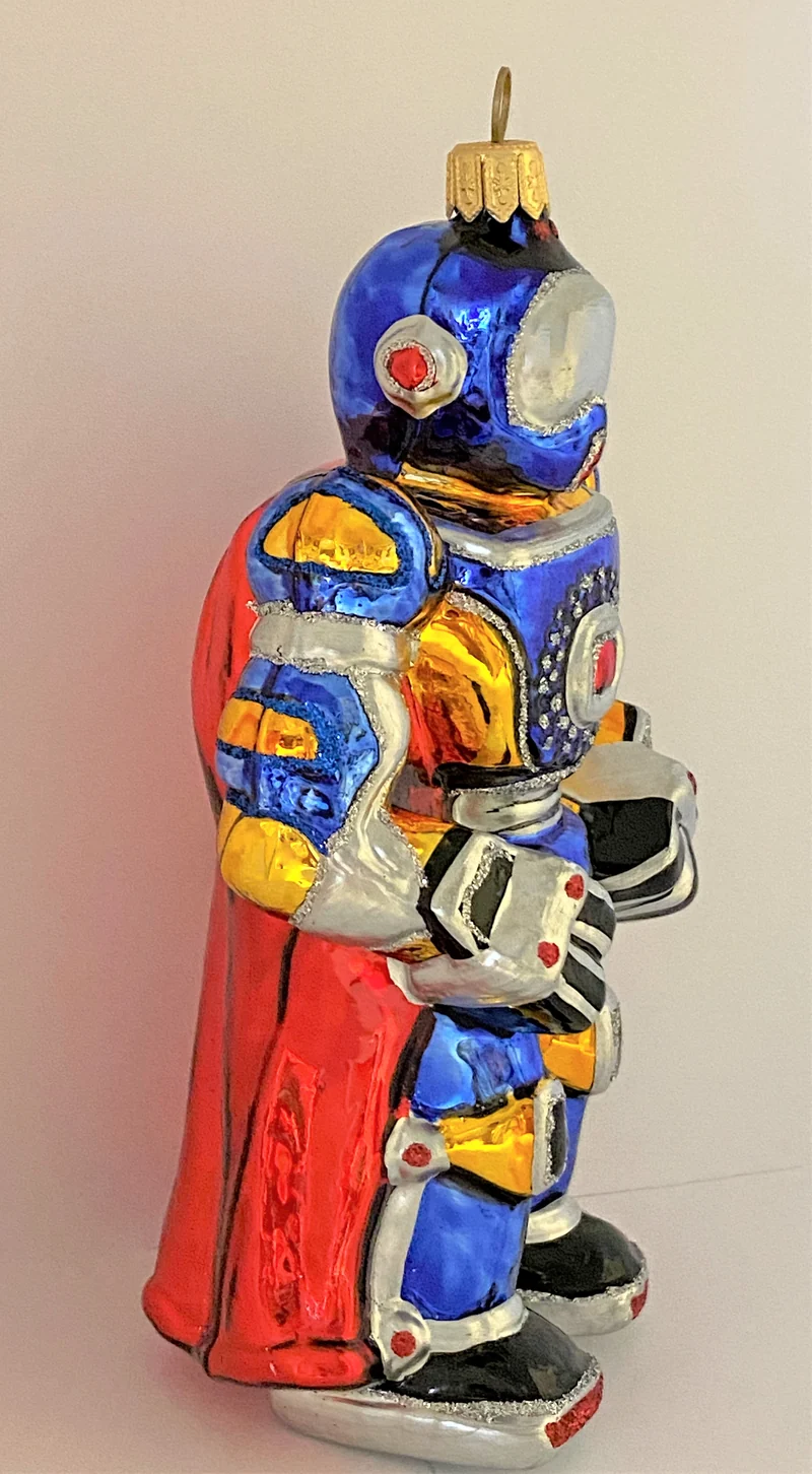 Roboter blau mit rotem Cape